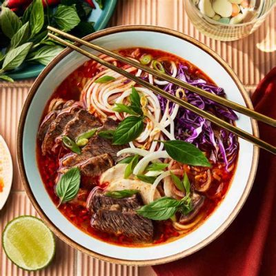 Bún bò Huế: A Symphony of Spicy, Aromatic Flavors and Silky Smooth Noodles!