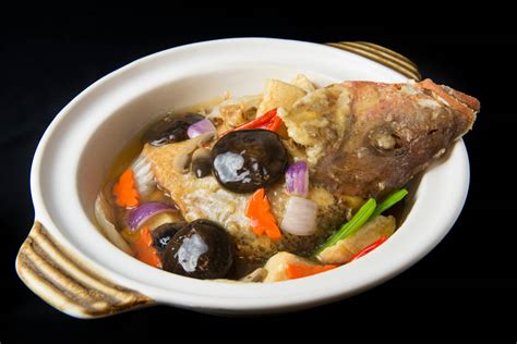  Claypot Fish Head With Preserved Vegetables? A Delicious Dive Into Meizhou's Earthy Comfort Food