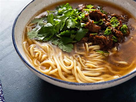  Hand-Pulled Noodles with Spicy Lamb Broth: A Symphony of Slurpable Satisfaction and Tangy Tectonic Taste Buds