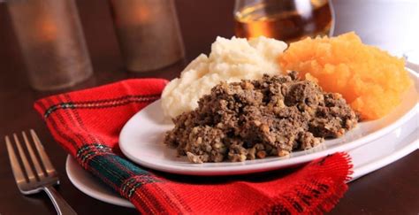  Irn-Bru-Glazed Haggis! A Quintessential Scottish Fusion Dish that Melds Sweet and Savory Flavors